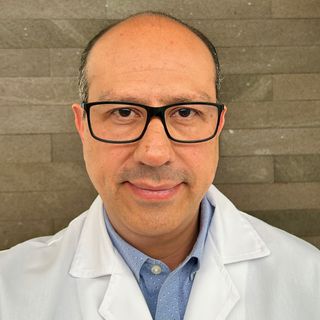 Dr. Angel Edgar Cacique Borrego